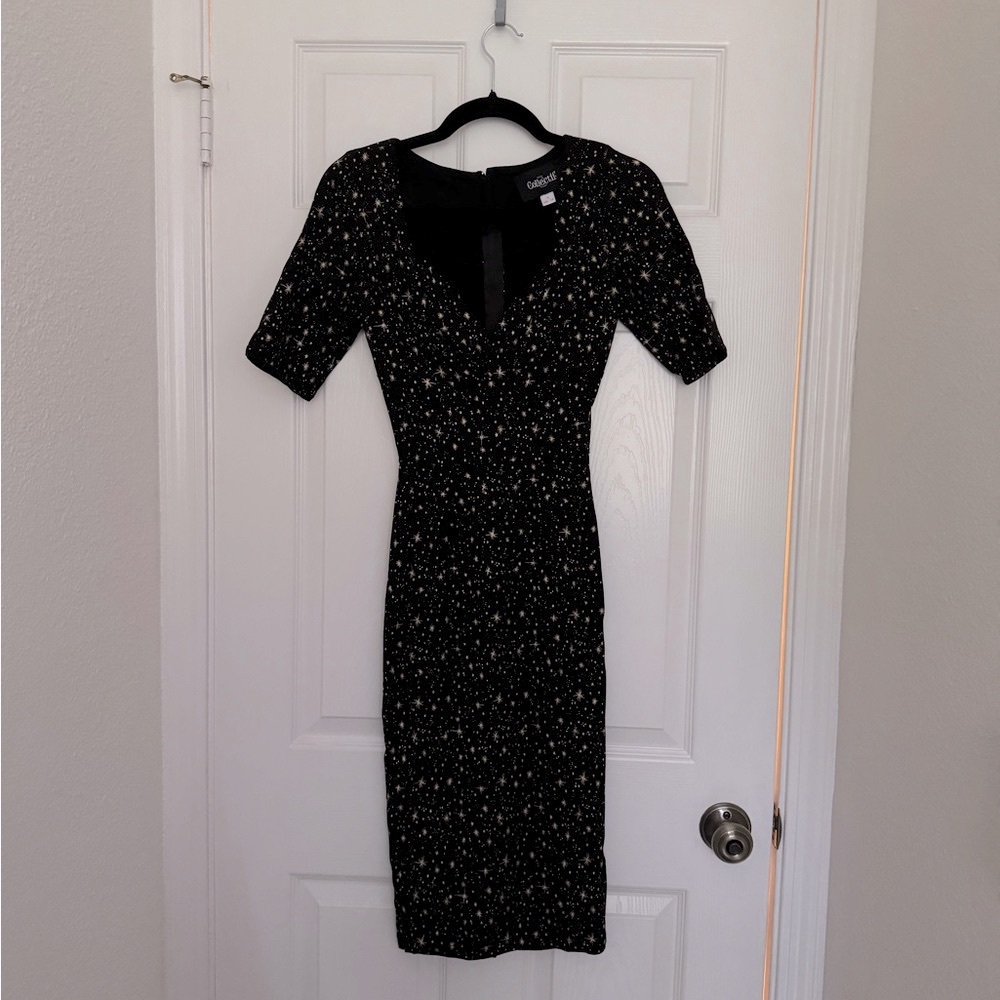 NWOT Collectif Black and Gold Star Wiggle Dress